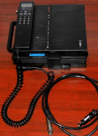 ABB C2 portable Autotelefon BBC Veriphon C45-2 (bgl. Siemens) 1988-1991 NP: 7600DM Leistung: 16W PKW/2.5W Porty 7kg inkl. Autoladekabel & orig. Firmen Telefonkarte der Post (mit Magnetstreifen) für C-Netz und Kartentelefone